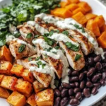 Chipotle Chicken Bowl with Black Beans, Sweet Potatoes, and Cilantro Lime Sauce