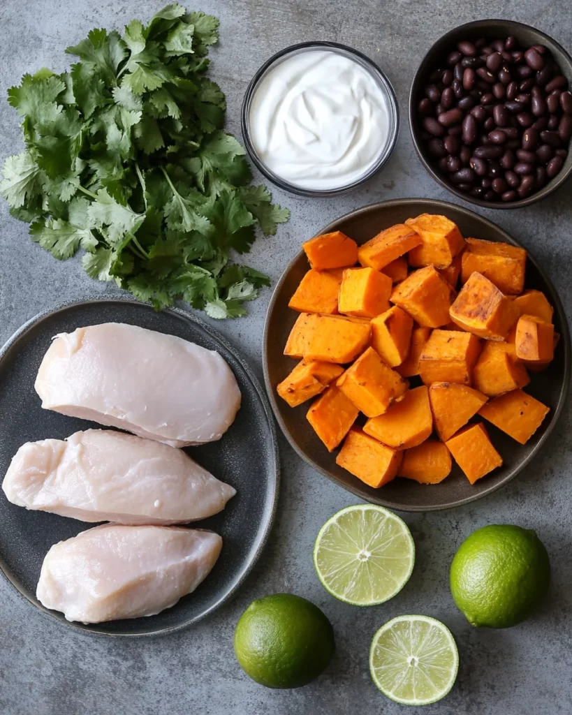 Chipotle Chicken Bowl with Black Beans, Sweet Potatoes, and Cilantro Lime Sauce