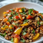 Ground turkey and colorful bell peppers in a savory one-skillet meal