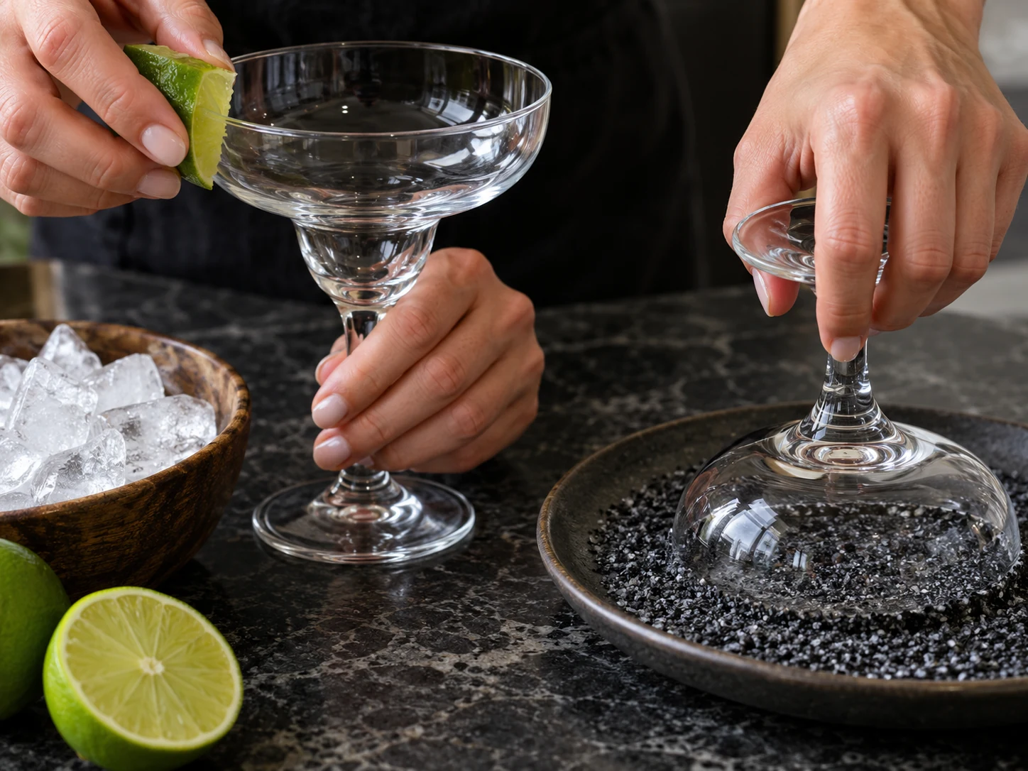 Margarita glass rim prepared with fresh lime and food-safe black salt