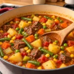 Old-Fashioned Vegetable Beef Soup with tender beef chuck potatoes carrots green beans corn and peas