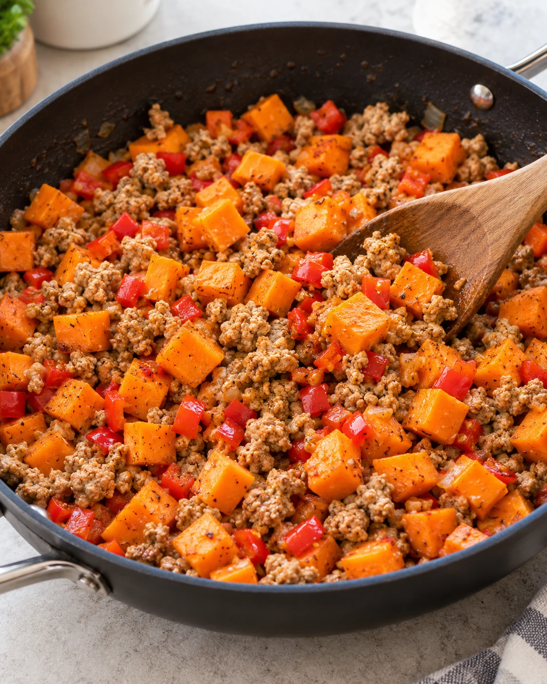 Ground turkey browning with sweet potatoes and smoked paprika